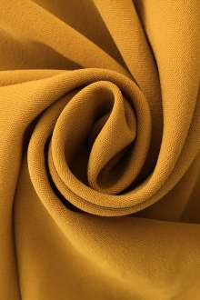 Polyester and Spandex Stretch Crepe in Crown Gold0