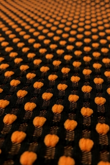 Polyester Swiss Dot Brocade with Orange Dots0